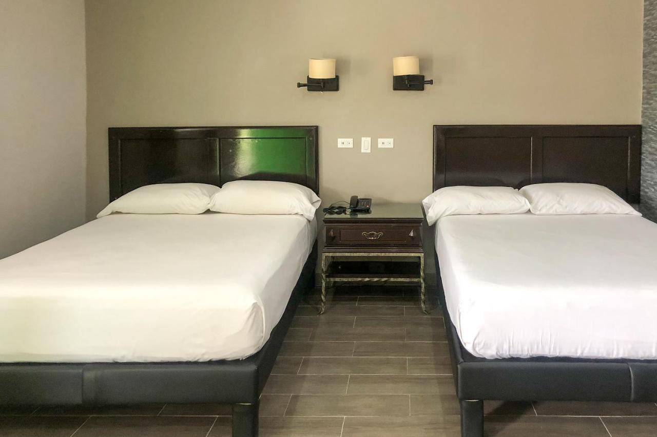 Capital O Palms Hotel, Acuna Ciudad Acuña المظهر الخارجي الصورة